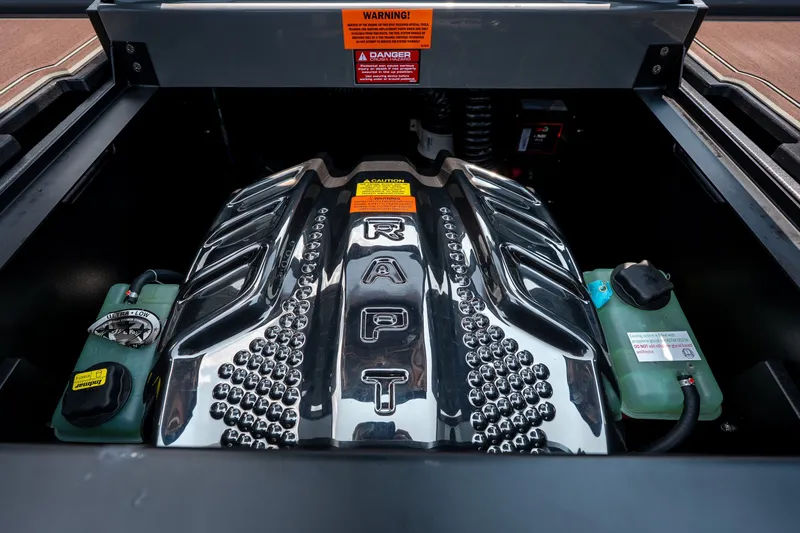 Slide: The Image of Engine compartment of 2026 Tigé Ultré 25ZX boat, featuring a Raptor engine. - 49