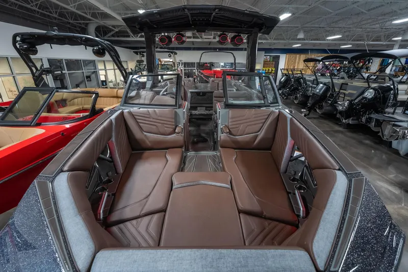 Slide: The Image of Interior view of 2026 Tigé Ultré 25ZX boat with luxurious seating and modern design. - 44