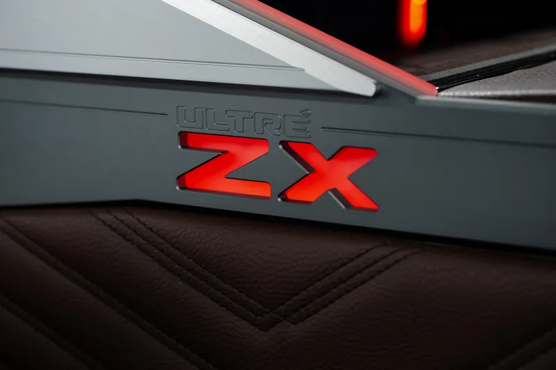Slide: The Image of 2026 Tigé Ultré 25ZX logo with illuminated red "ZX" detail. - 19