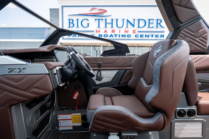 Slide: The Image of 2026 Tigé Ultré 25ZX boat interior at Big Thunder Marine showroom. - 35