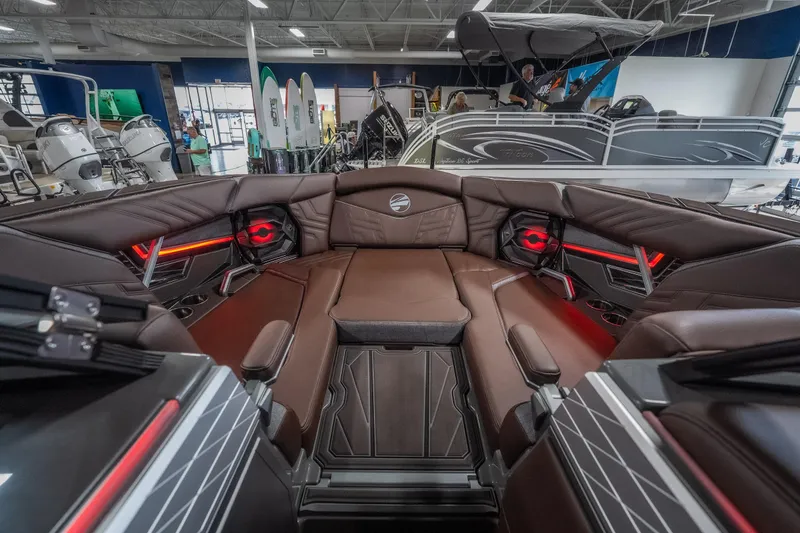 Slide: The Image of Luxurious interior of 2026 Tigé Ultré 25ZX boat with modern seating and ambient lighting. - 15