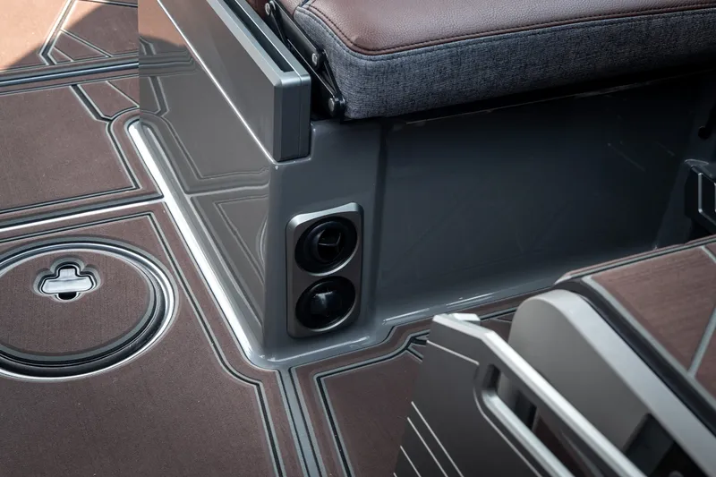 Slide: The Image of Interior detail of 2026 Tigé Ultré 25ZX boat, featuring sleek seating and modern design elements. - 34
