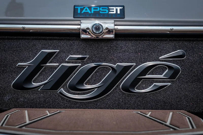 Slide: The Image of Tigé Ultré 25ZX 2026 boat logo with TAPS3T surf system. - 13