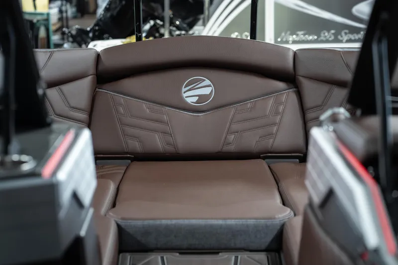 Slide: The Image of 2026 Tigé Ultré 25ZX boat interior with luxurious brown leather seating. - 17