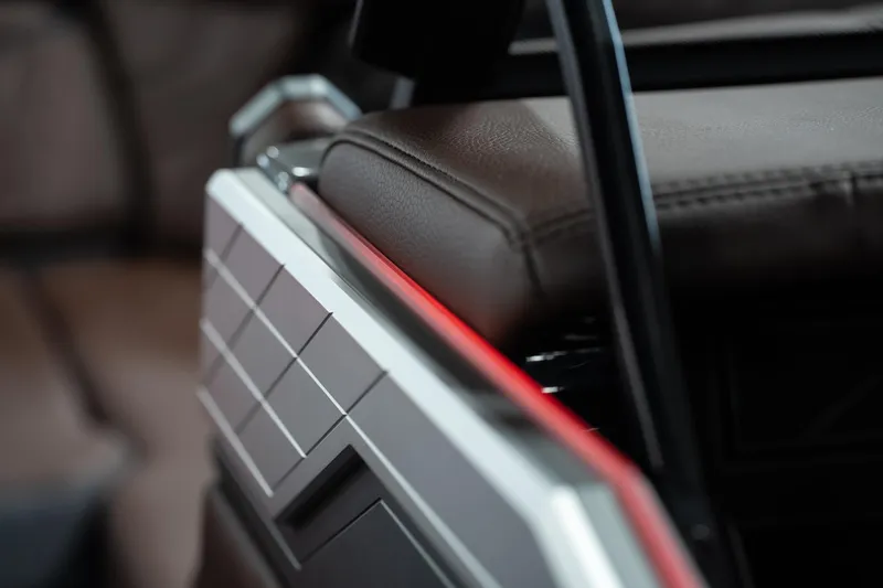 Slide: The Image of Close-up of 2026 Tigé Ultré 25ZX boat interior with sleek design and leather seating. - 36