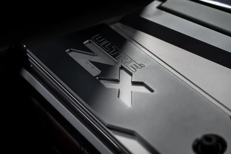 Slide: The Image of Close-up of 2026 Tigé Ultré 25ZX logo on metallic surface. - 37