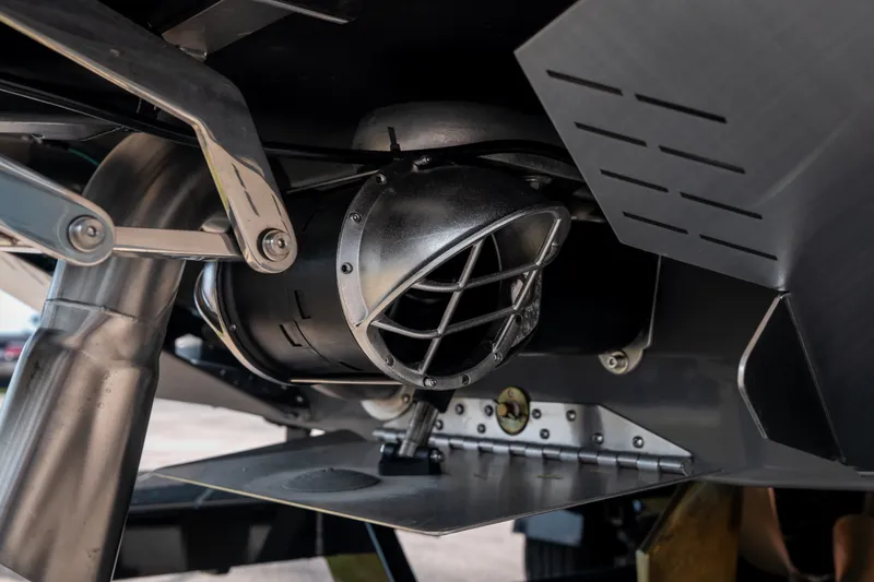 Slide: The Image of Close-up of 2026 Tigé Ultré 25ZX boat's advanced propulsion system. - 12