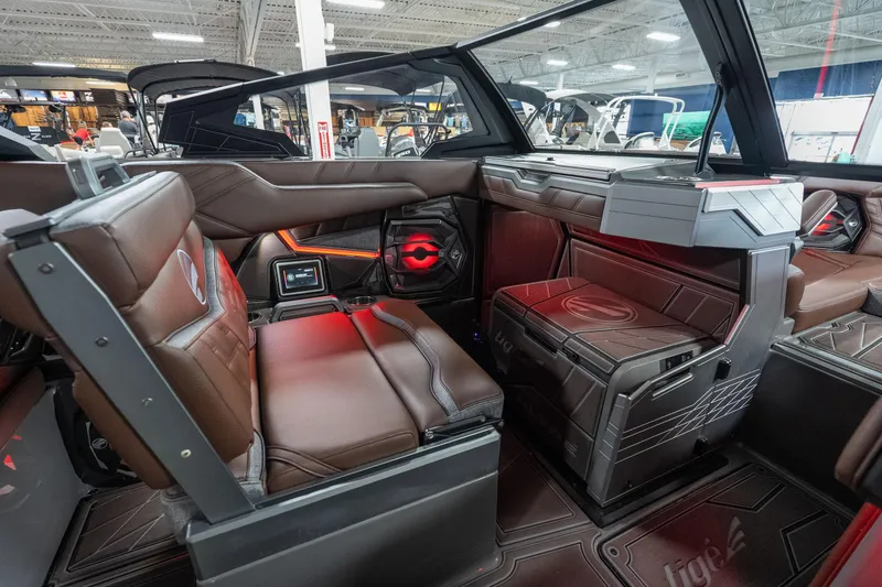 Slide: The Image of Luxurious interior of 2026 Tigé Ultré 25ZX boat with modern seating and sleek design. - 14
