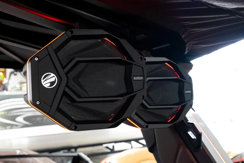 Slide: The Image of High-quality Audison speakers on 2026 Tigé Ultré 25ZX boat, featuring sleek design and vibrant lighting. - 28