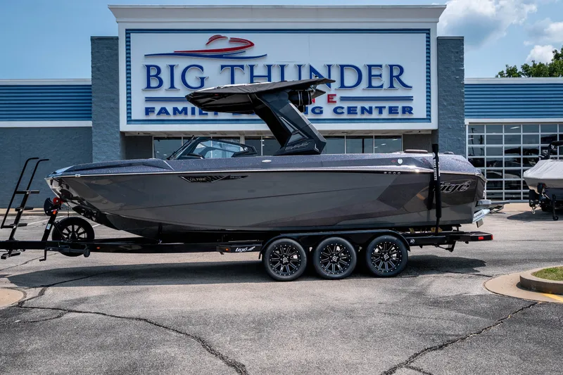 Slide: The Image of 2026 Tigé Ultré 25ZX boat on trailer at Big Thunder Marine Center. - 15