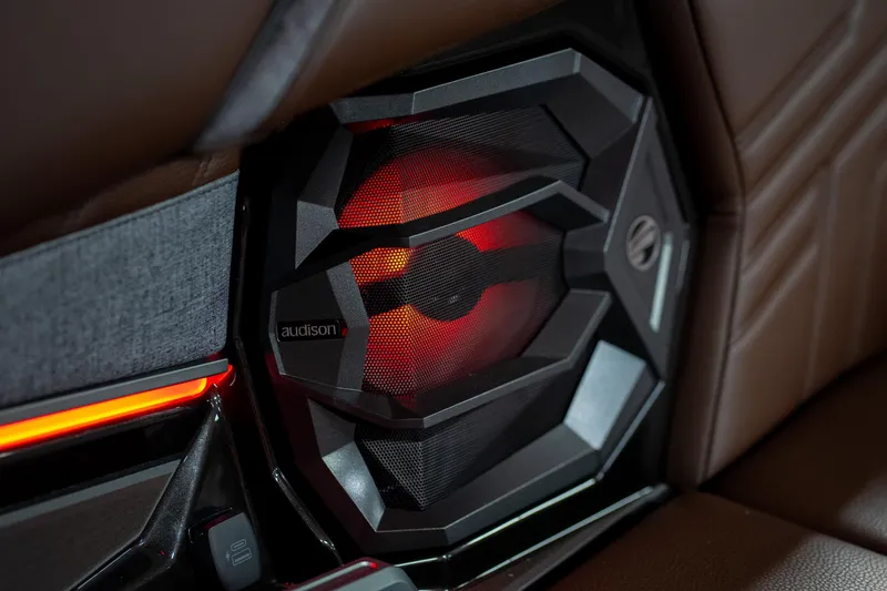 Slide: The Image of 2026 Tigé Ultré 25ZX interior speaker with modern design and ambient lighting. - 30