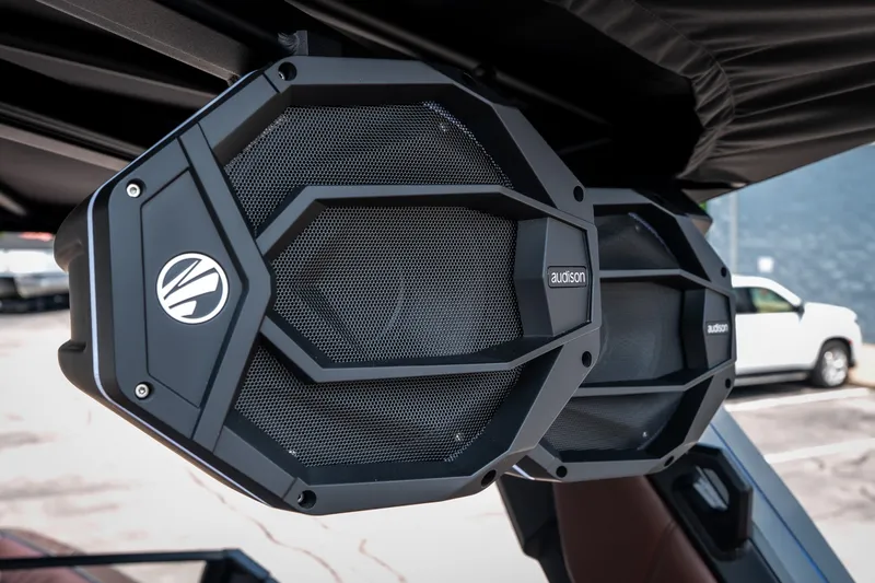 Slide: The Image of 2026 Tigé Ultré 25ZX boat speakers, featuring Audison audio system, close-up view. - 26