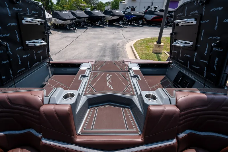 Slide: The Image of 2026 Tigé Ultré 25ZX boat interior with luxurious seating and cup holders. - 45