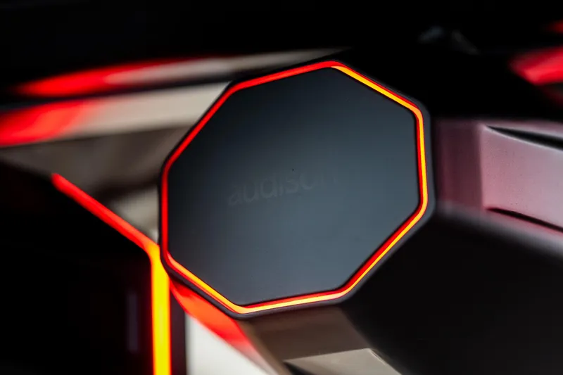 Slide: The Image of Close-up of 2026 Tigé Ultré 25ZX speaker with red LED lighting. - 27