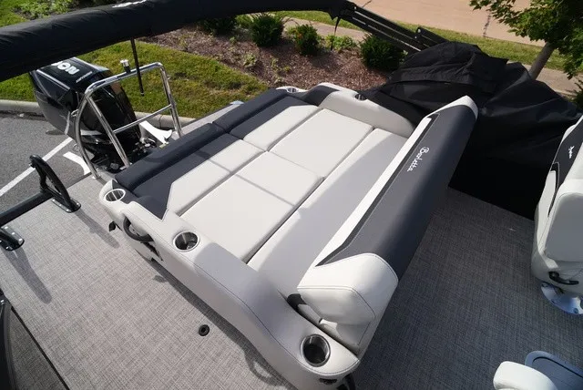 Slide: The Image of The image shows the lounge seating of a 2027 Barletta A24UC boat. - 14