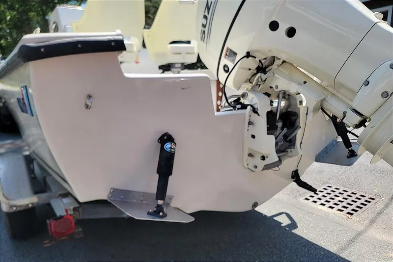 Slide: The Image of 1978 Wellcraft V-20 Steplift boat with Suzuki outboard motor on trailer. - 12