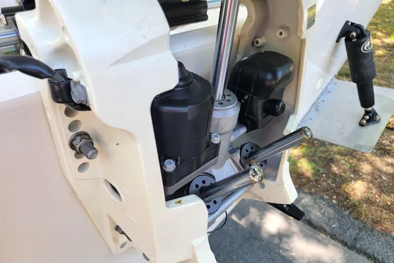 Slide: The Image of Close-up of a 1978 Wellcraft V-20 Steplift boat engine components. - 13