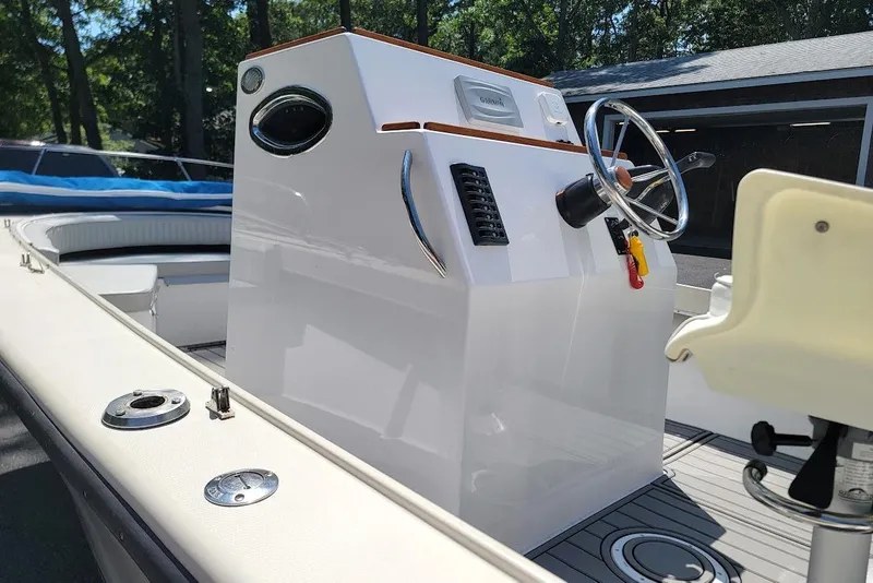 Slide: The Image of 1978 Wellcraft V-20 Steplift boat interior with steering wheel and seating. - 18