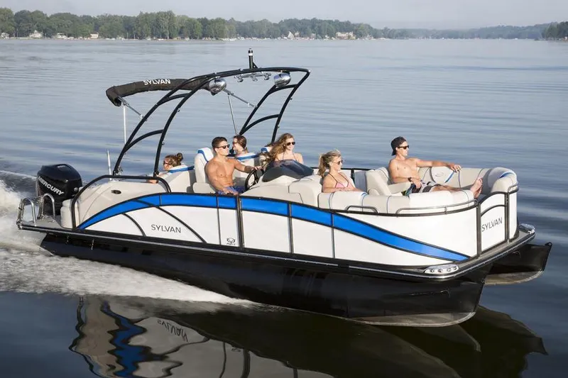 Slide: The Image of Manufacturer Provided Image: 2017 Sylvan S3 Extreme pontoon boat cruising on a lake with passengers. - 2