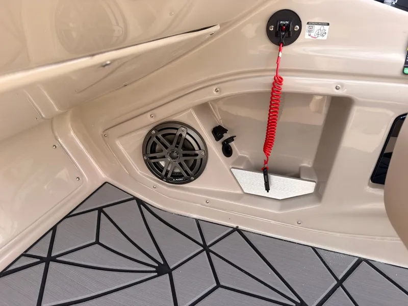 Slide: The Image of Close-up of a boat interior with speaker and safety lanyard. - 34