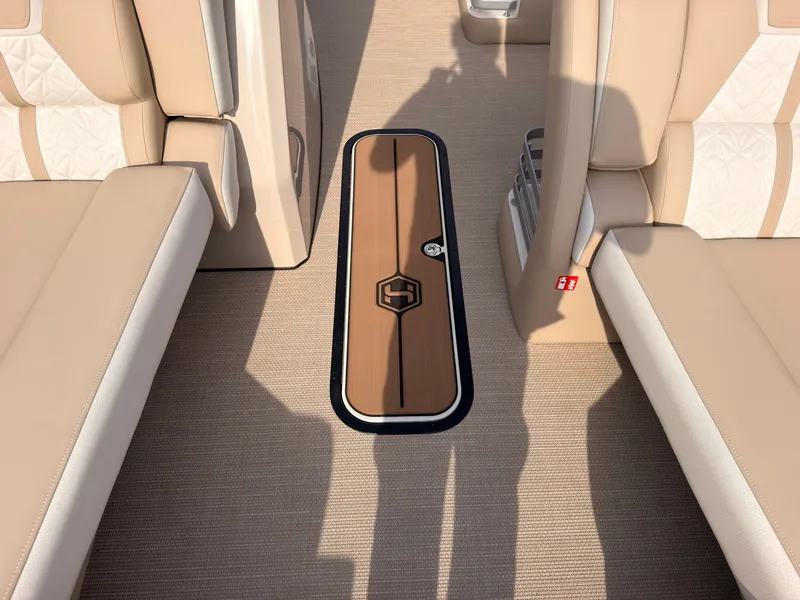 Slide: The Image of Interior of a Harris Grand Mariner 230 with beige seating and a wooden floor panel. - 22