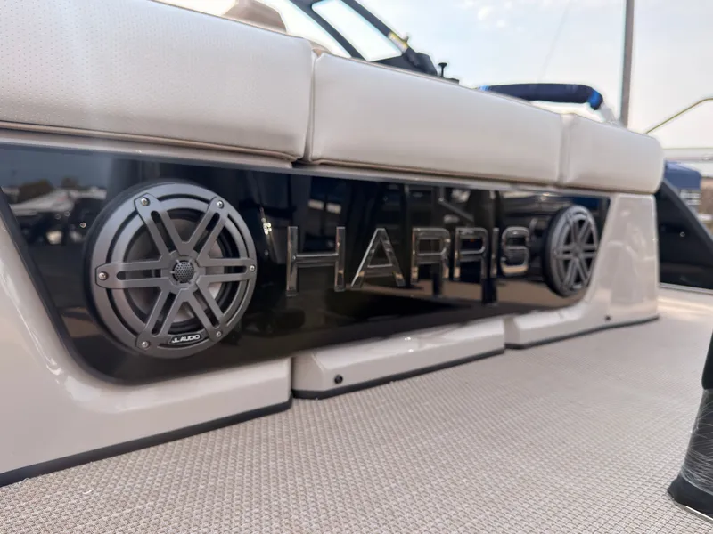 Slide: The Image of Close-up of a Harris Grand Mariner 230 with speakers and cushioned seating. - 48