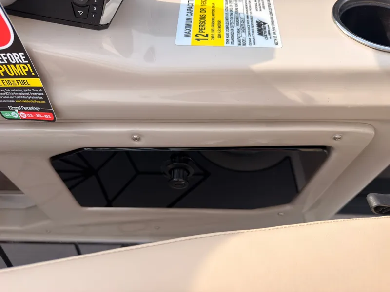 Slide: The Image of Close-up of a boat dashboard with controls and warning labels. - 33