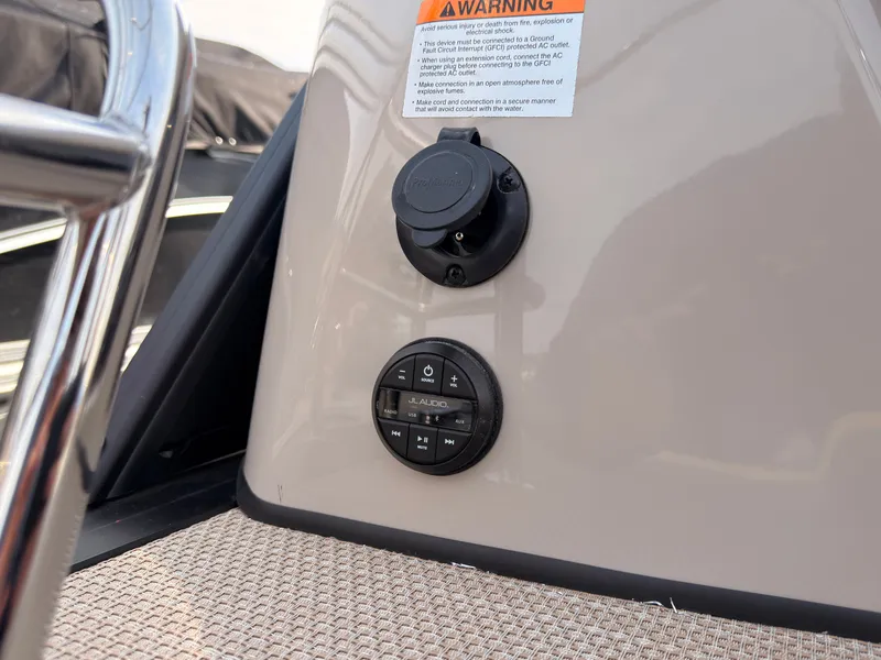 Slide: The Image of Close-up of a control panel with controls and a warning label. - 49