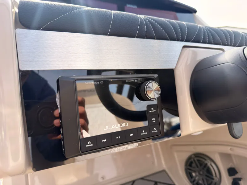 Slide: The Image of Close-up of a JL Audio system on a boat, surrounded by sleek finishes. - 29
