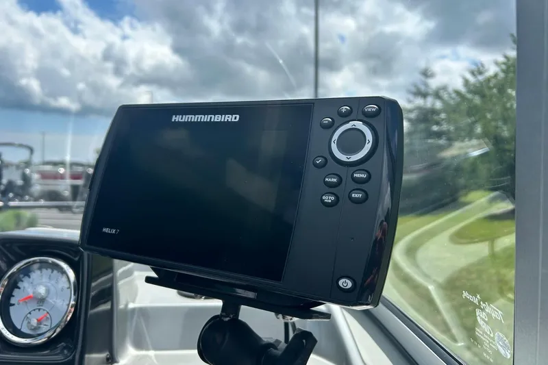 Slide: The Image of Humminbird Helix 7 fish finder on 2018 Tracker Pro Guide V-16 WT boat dashboard. - 9