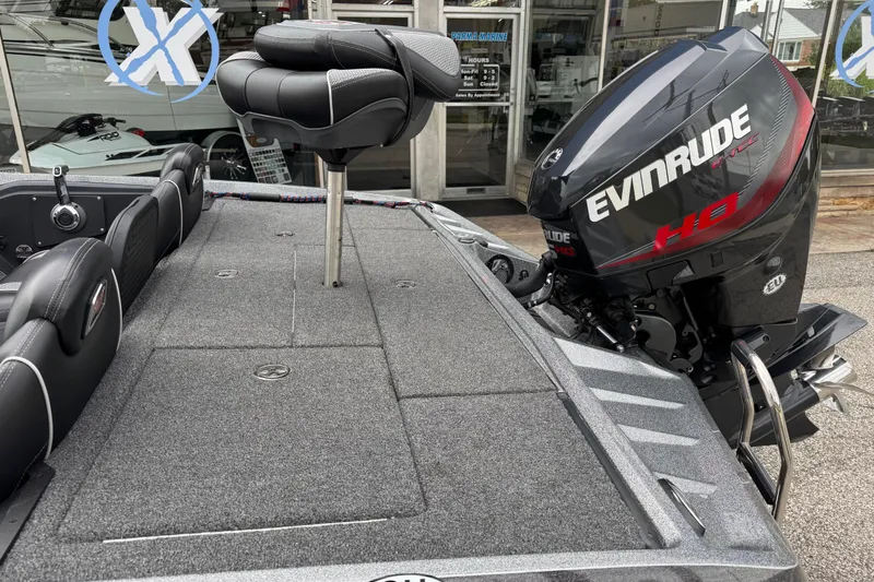 Slide: The Image of 2020 Ranger Z175 boat with Evinrude engine, featuring sleek seating and modern design. - 8
