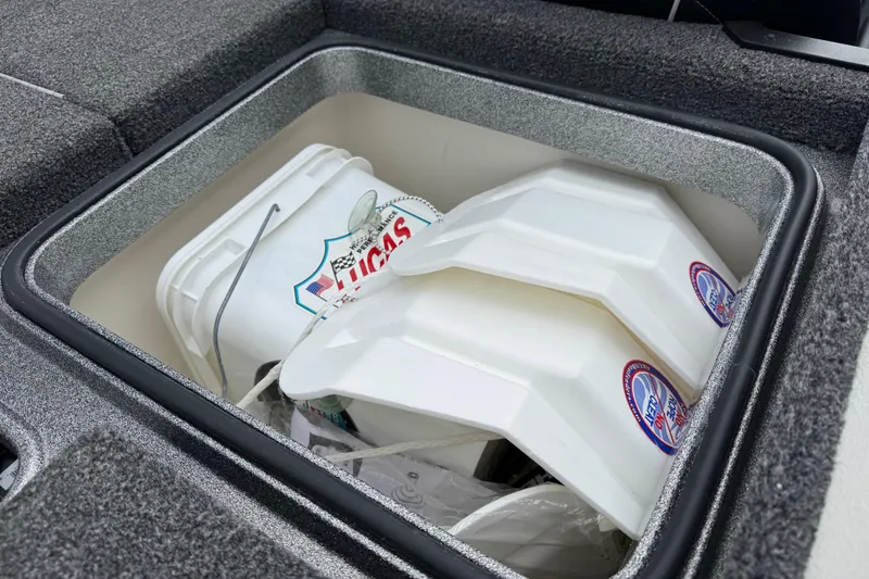 Slide: The Image of Storage compartment in 2020 Ranger Z175 boat with buckets and accessories. - 16