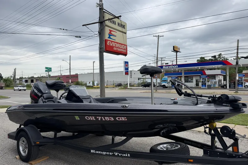 Slide: The Image of 2020 Ranger Z175 boat on trailer near Parma Marine and Marathon gas station. - 6