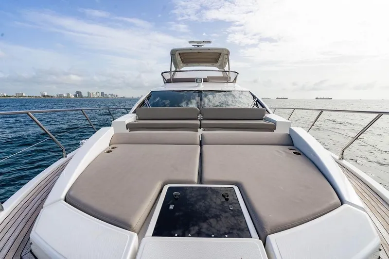 Slide: The Image of Luxurious 2016 Azimut 50 yacht with spacious sun deck, cruising on open sea. - 13