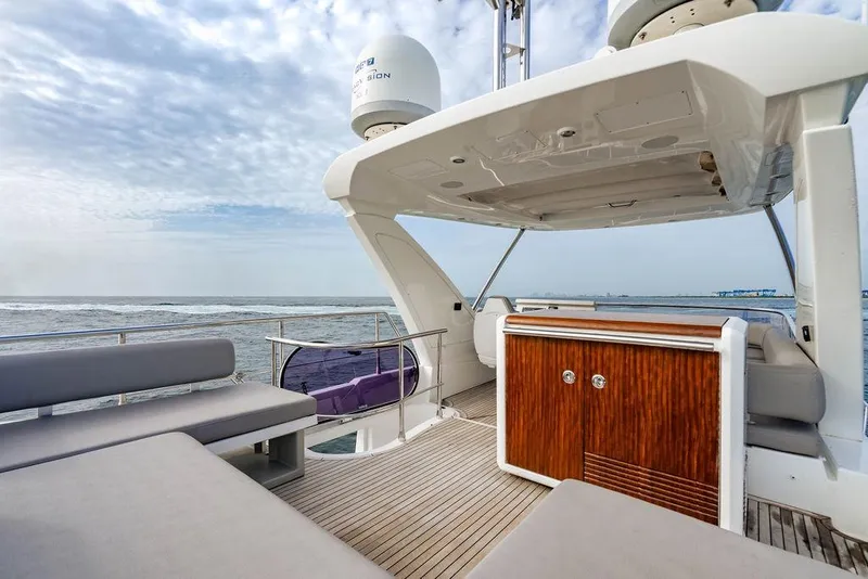 Slide: The Image of Luxurious 2016 Azimut 50 yacht deck with elegant seating and ocean view. - 34