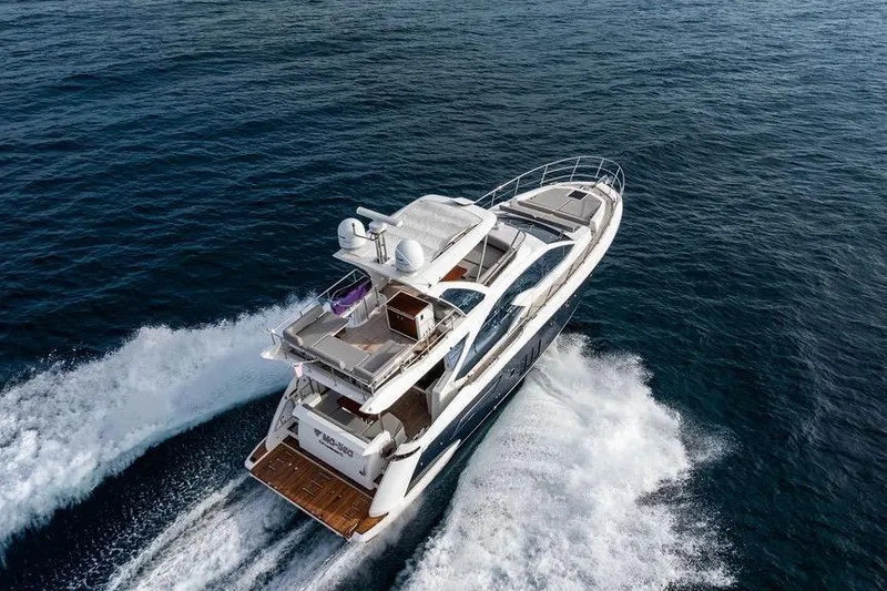 Slide: The Image of A luxurious 2016 Azimut 50 yacht speeds across the open sea. - 2
