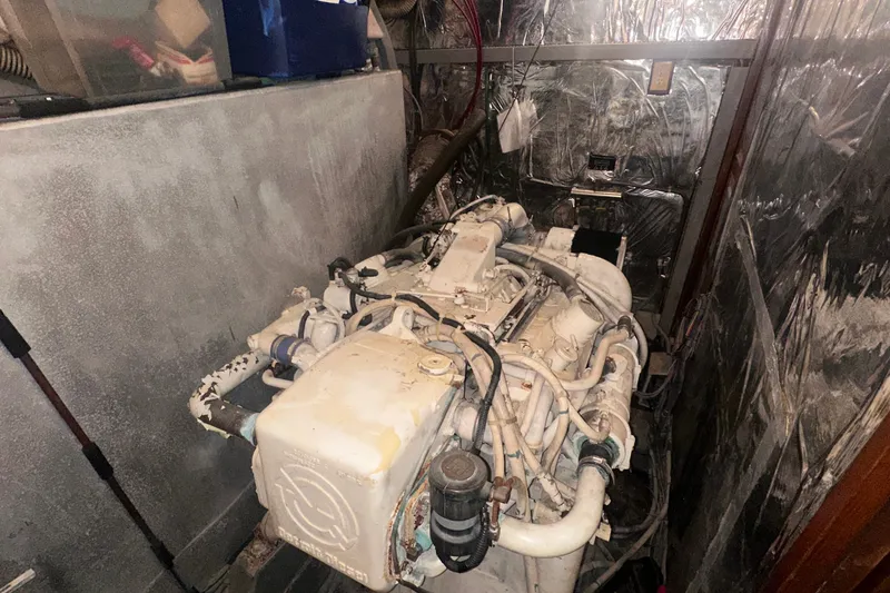 Slide: The Image of Engine room of 1989 Jefferson Marquessa 52 Extended Deckhouse with visible machinery and wiring. - 39