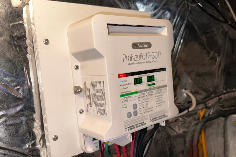 Slide: The Image of ProNautic 12:30P marine battery charger installed on a 1989 Jefferson Marquessa 52 yacht. - 40