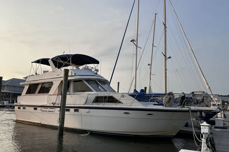 The Image of 1989 Jefferson Marquessa 52 Extended Deckhouse yacht docked at marina. - 0
