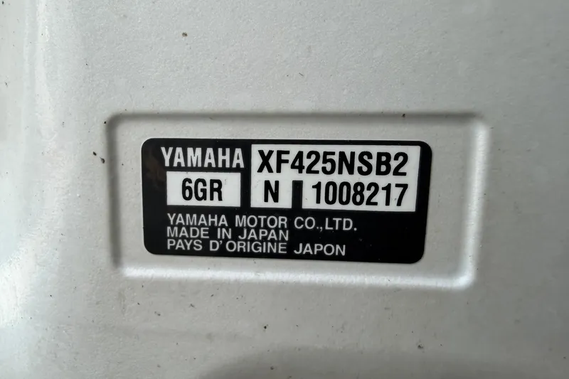 Slide: The Image of Yamaha XF425NSB2 engine label on 2023 Regulator 31, made in Japan. - 43