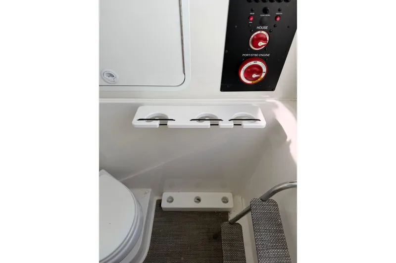 Slide: The Image of 2023 Regulator 31 boat interior with control panel and seating area. - 36