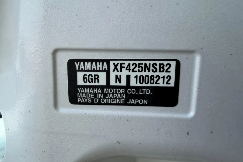 Slide: The Image of Label on Yamaha motor, model XF425NSB2, made in Japan, on Regulator 31, 2023. - 44