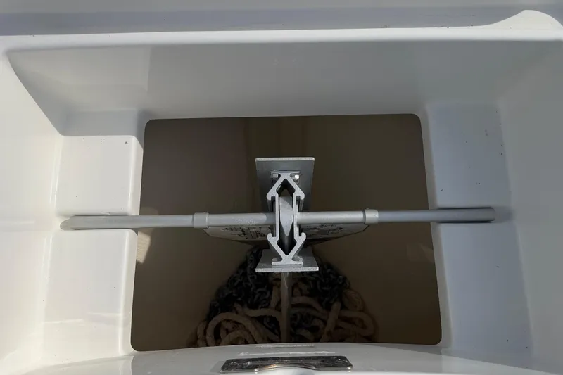 Slide: The Image of Anchor storage compartment on 2023 Regulator 31 boat, featuring secure anchor placement. - 40