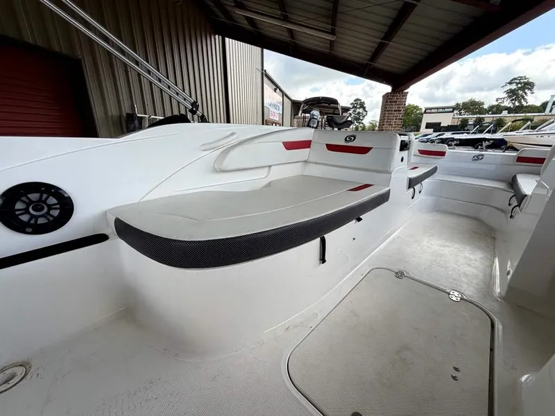 Slide: The Image of The image shows the interior of a 2020 Godfrey boat with white and red seating. - 11