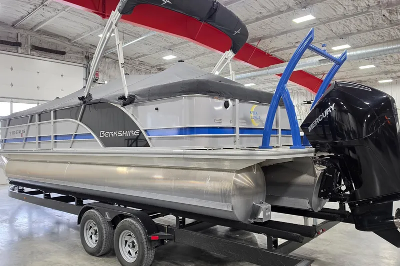 Slide: The Image of 2022 South Bay 25 CTS pontoon boat on trailer in indoor storage facility. - 75