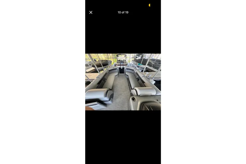 Slide: The Image of 2022 South Bay 25 CTS pontoon boat interior with spacious seating and modern design. - 10