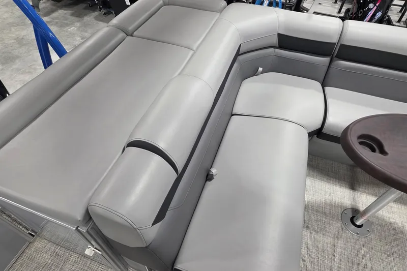 Slide: The Image of Luxurious seating on 2022 South Bay 25 CTS pontoon boat with sleek gray upholstery. - 21