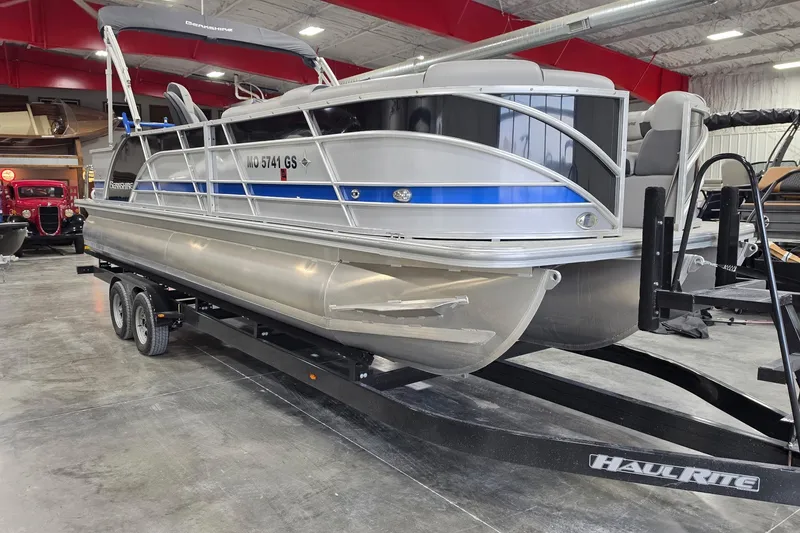 Slide: The Image of 2022 South Bay 25 CTS pontoon boat on trailer in showroom. - 36