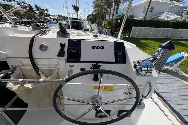 Slide: The Image of Cockpit of 2020 Lagoon 40 catamaran with B&G navigation system and steering wheel. - 32