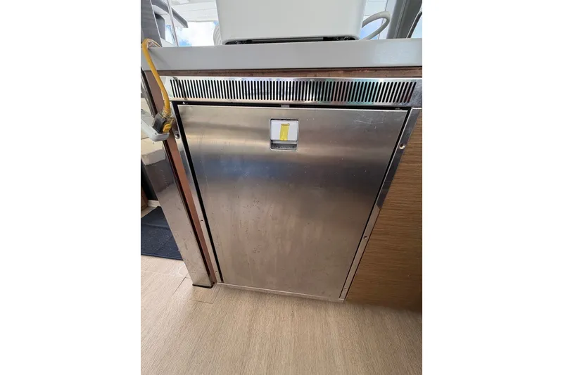 Slide: The Image of Stainless steel appliance in 2020 Lagoon 40 yacht interior. - 8